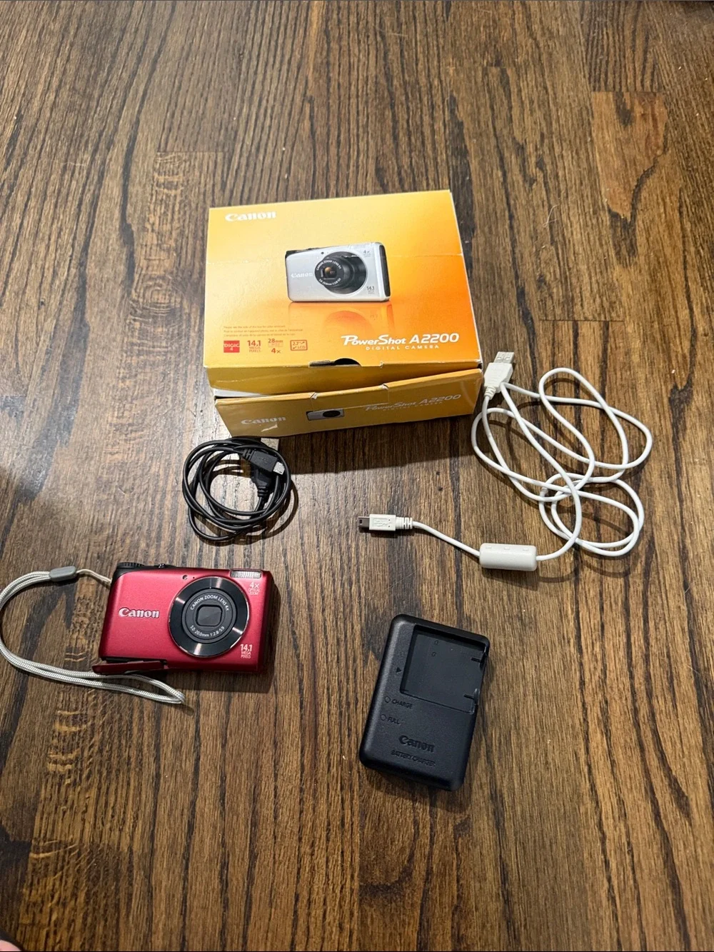 Canon PowerShot A2200 Digital Camera with Charger and Cables